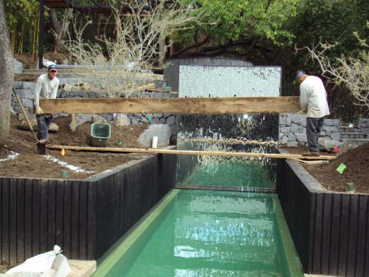 PLACING RAMP ACROSS POOL